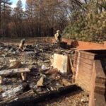 The remains of a front porch burned down by the Camp Fire in Paradise, CA