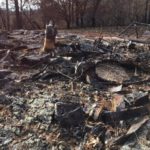 The remainder of a home that was burned down from the Camp Fire in Paradise, CA